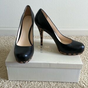 Black Coach heels  with “C” print on heel